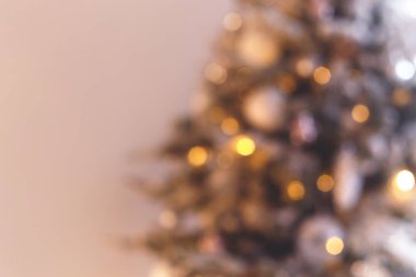 Blurred photo. Christmas tree and burning candles background