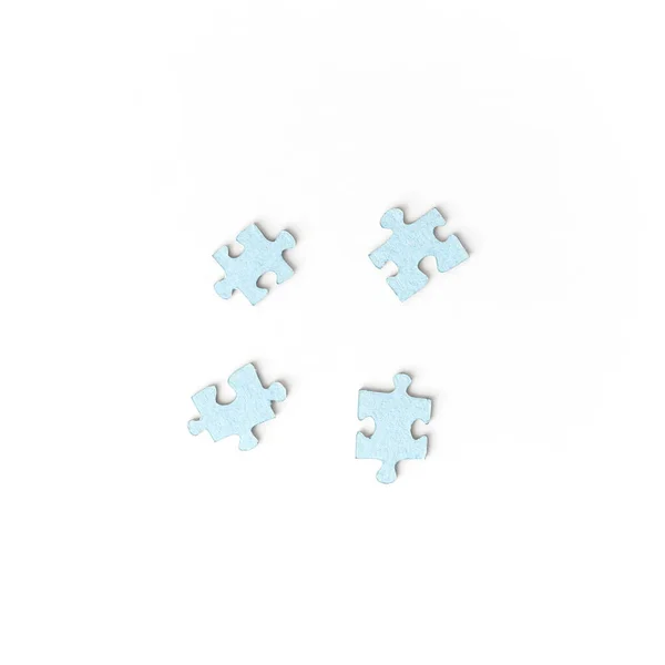 Ongeschikte vier puzzelstukjes op witte achtergrond. Bovenaanzicht — Stockfoto