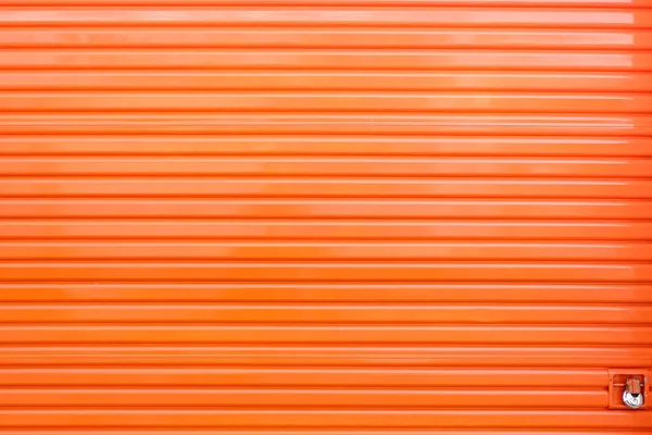 Une porte en métal orange — Photo