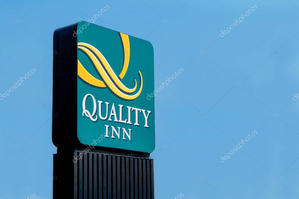 Denver, CO, USA - August, 2017: Logo of the Quality Inn Hotel and Suites in Denver, Colorado.