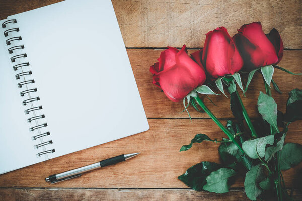 Red rose and cup of coffee