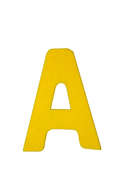 Жовта дерев'яна літера А — стокове фото