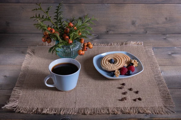 coffee and cookies are on the table