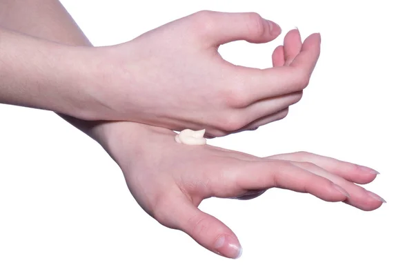 白い背景の女性の手のひらに肌のためのクリーム — ストック写真
