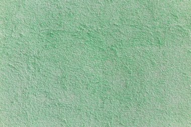 Yeşilimsi kaba doku duvar veya homojen arka plan deseni