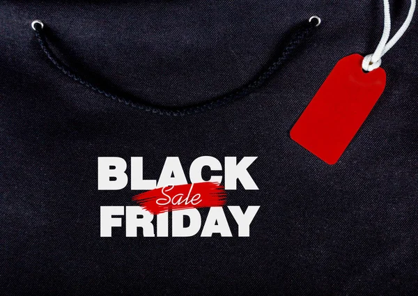 yazıt siyah Cuma günü bir dize ile siyah bir çanta arka plan etiketi