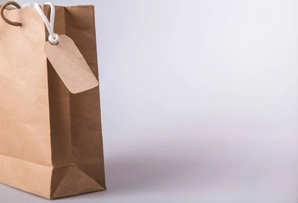 black friday idea, cardboard bag and tag for text on it.