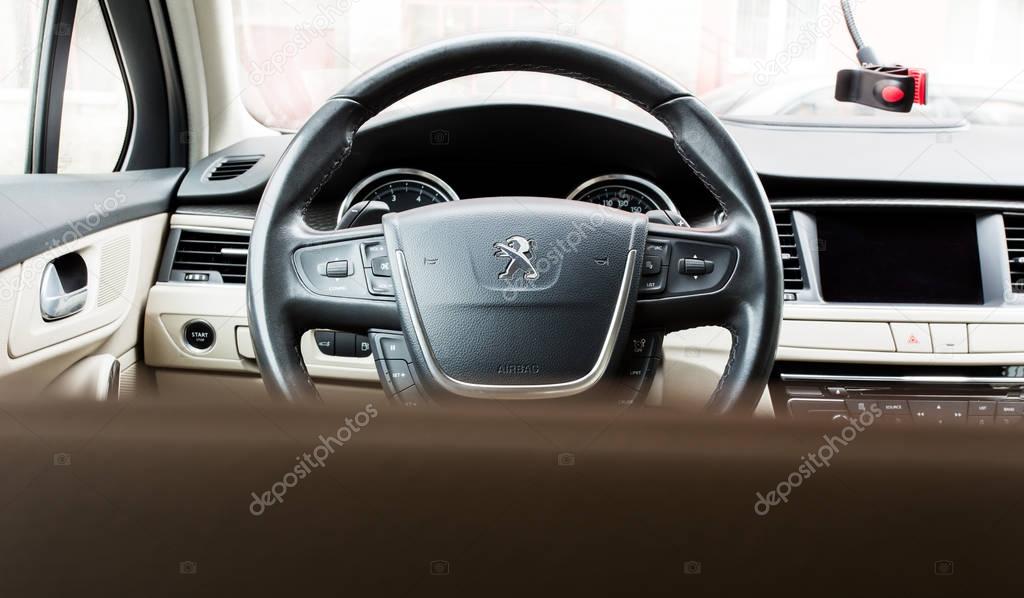 Ufa, Russia September 17: steering wheel in the light interior of the Peugeot car