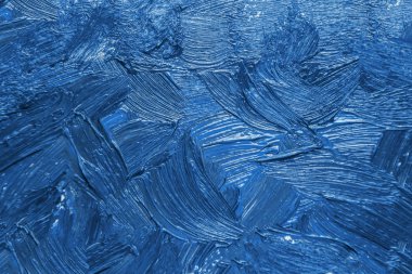 Çadır bezindeki yağlı boya dokusu, arka plan. renk 2020 klasik mavi