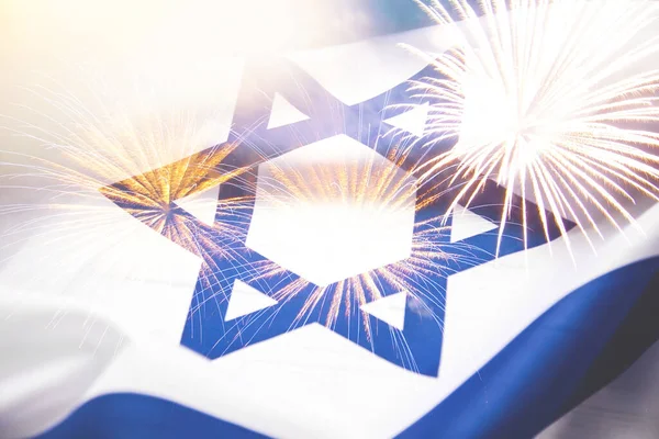 Close up shot of wavy blue and white Israeli flag. Happy independence day Israel, top view, flat lay