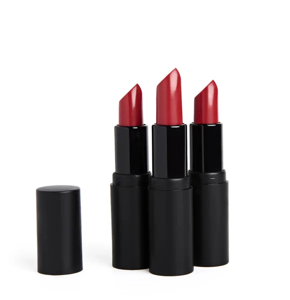 Red lipstick packages — Stock Photo, Image