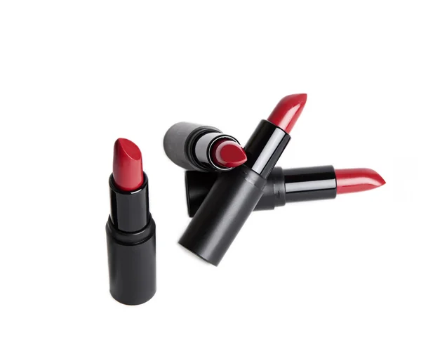 Red lipstick packages — Stock Photo, Image