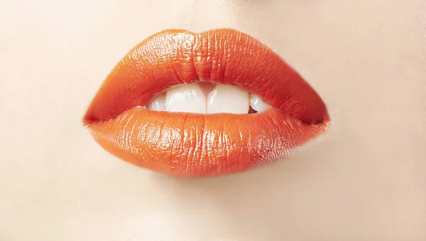 Mouth with orange lipstick Stock Photo by Â©annadeba 147826477