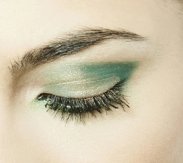 Eye with green eyeshadow — Stock Photo, Image