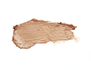 beyaz arkaplanda izole edilmiş bej altın rengi parlak ruj.