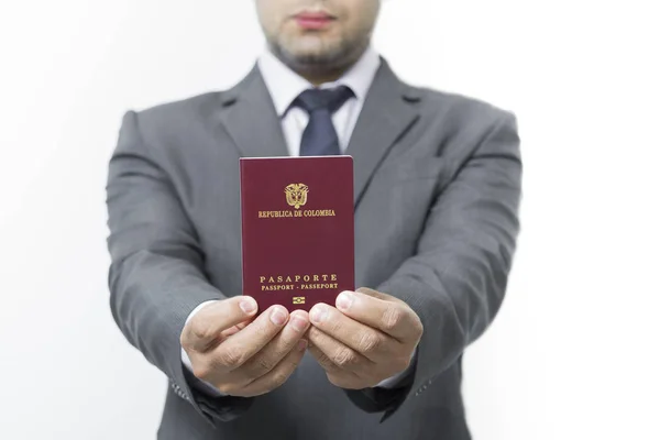 Businessman holding Colombian passport — Stock Photo, Image