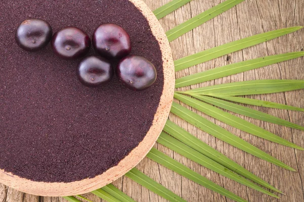 Früchte und Acai-Pulver aus dem Amazonas (Euterpe oleracea)) — Stockfoto