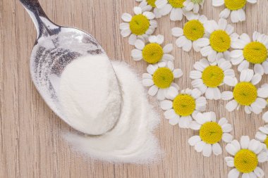Hidrolize kolajen Protein ahşap arka plan üzerinde