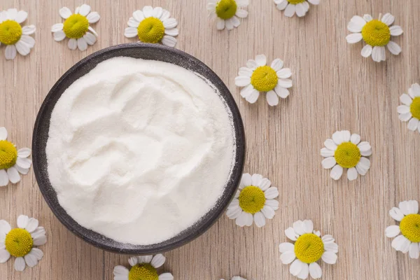 Hidrolize kolajen Protein ahşap arka plan üzerinde