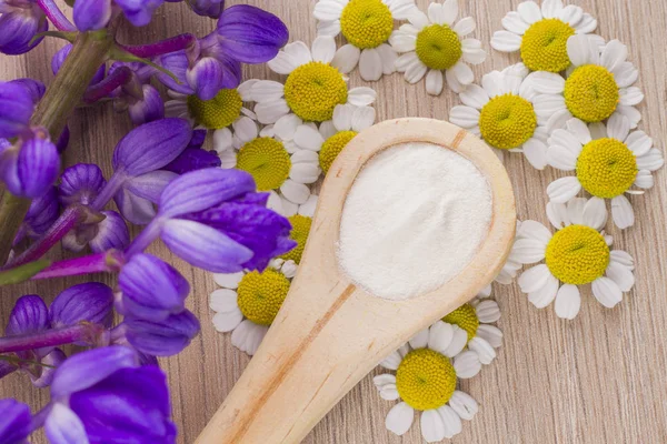 Hydrolyzed Collagen Protein on Wood Background