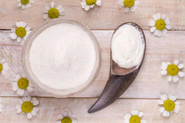 Hidrolize kolajen Protein ahşap arka plan üzerinde