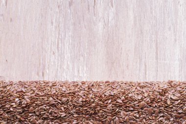 ahşap arka plan - Linum usitatissimum keten tohumu