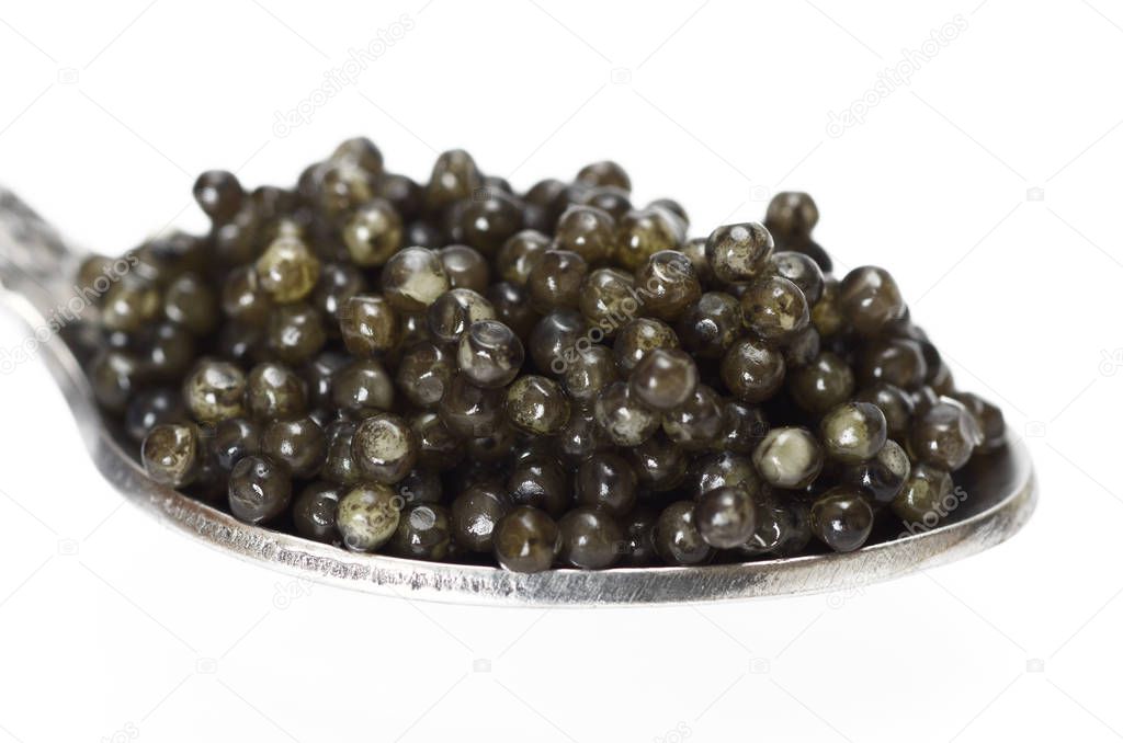 Spoon black caviar closeup
