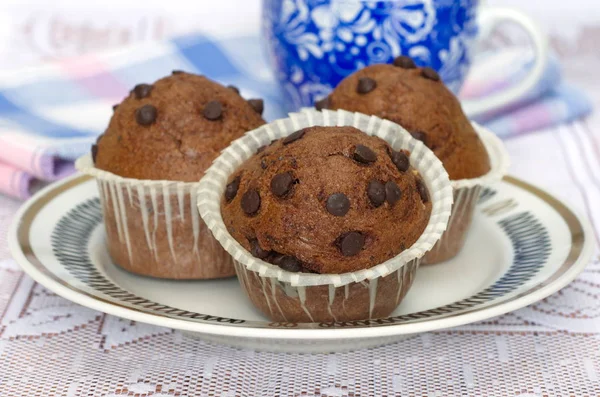 Muffins with chocolate on the plate — Stock Photo, Image