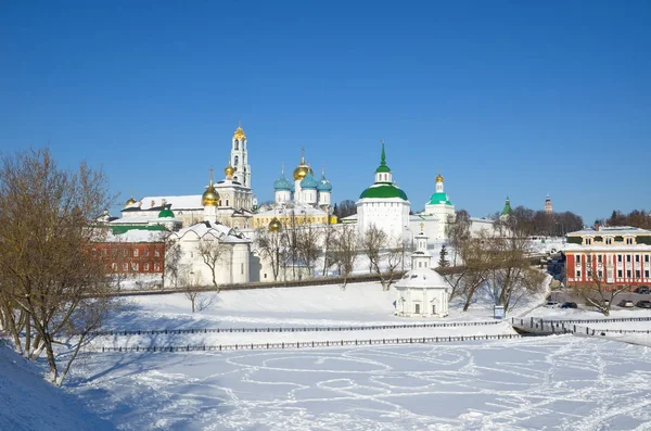 View from Blinnaya hill of snow-covered architectural ensemble of Holy Trinity - St. Sergius Lavra with Chapel of Pyatnitsky Well in front of the monanastery, Moscow region, Russia