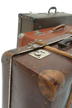 Vintage Suitcase over a white background. Isolated