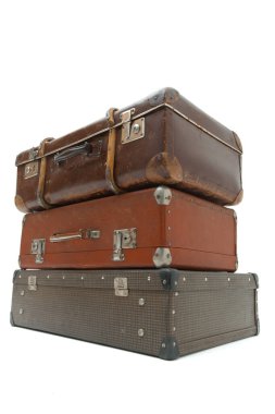 Vintage Suitcase over a white background. Isolated