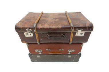 Vintage Suitcase over a white background. Isolated