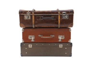 Vintage Suitcase over a white background. Isolated