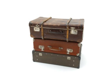 Vintage Suitcase over a white background. Isolated