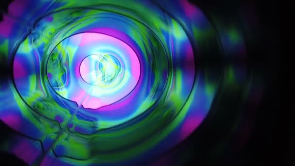 Iridescent oily full color paints on surface of water. Eenergy of light in outer space — Stock Video