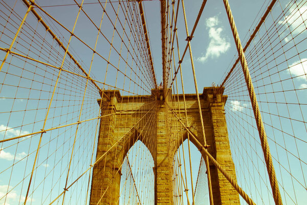 Brooklyn bridge and cable with sky in old vintage style, New York