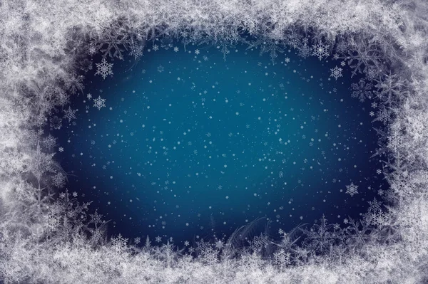 Snowflakes on dark blue background — Stock Photo, Image