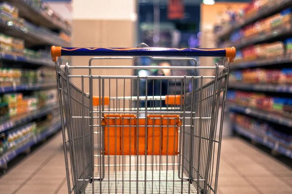 Abstract blurred photo of shopping cart/trolley Royalty Free Stock Images