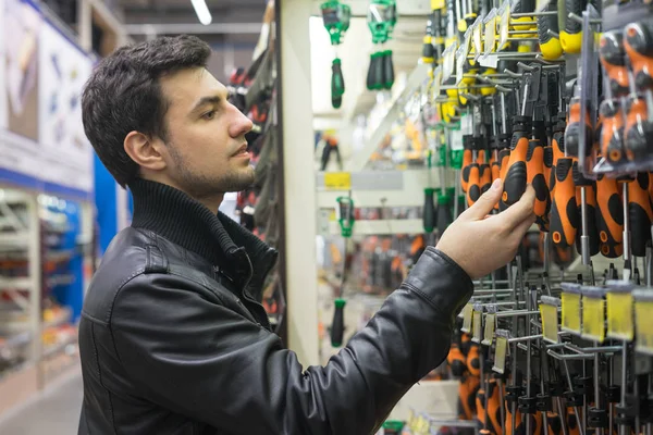 Male customer choosing screwdrivers — Stock Photo, Image