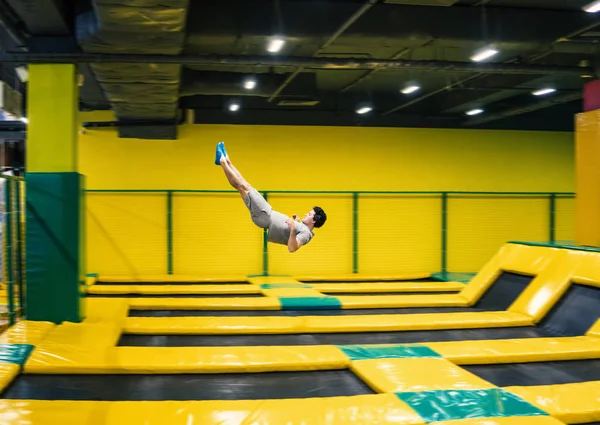 trampoline jumper performs acrobatic exercises on the trampoline