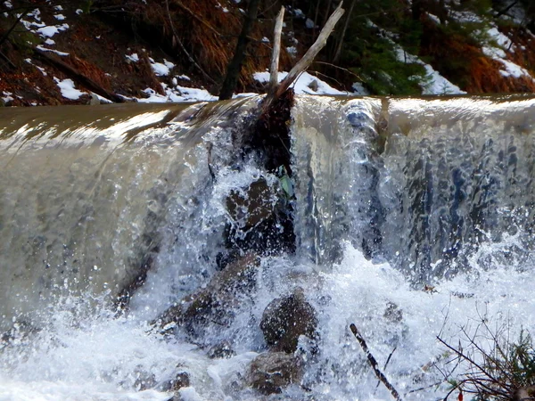 Small dam, melting snow, — Stock Photo, Image