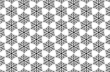 Beyaz bir arka plan üzerinde siyah kar tanesi