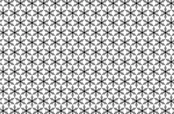 Beyaz bir arka plan üzerinde siyah kar tanesi