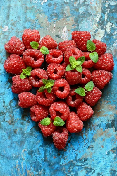 Heart Shape Made Premium Raspberries Blue Background Close Top View — 스톡 사진