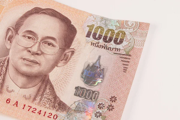 Close up de nota tailandesa, banho tailandês com a imagem de rei tailandês. Nota tailandesa de 1000 bahts tailandeses. Conceitos monetários tailandeses . — Fotografia de Stock