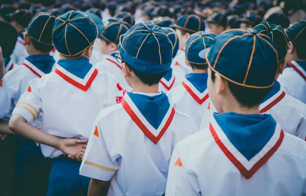 Backside of asian boy scout group line up and prepare for boy scout camp activities.