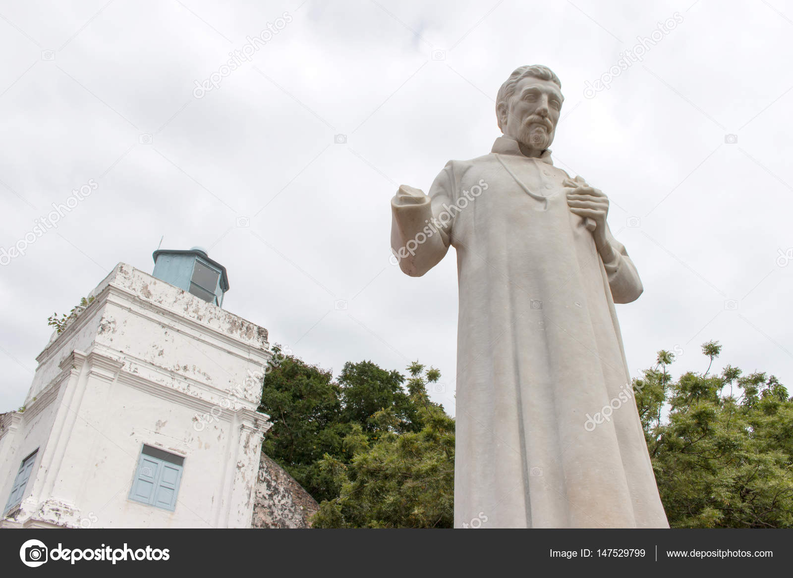 Statue of Saint Francis Xavier in outside of the church in front of the