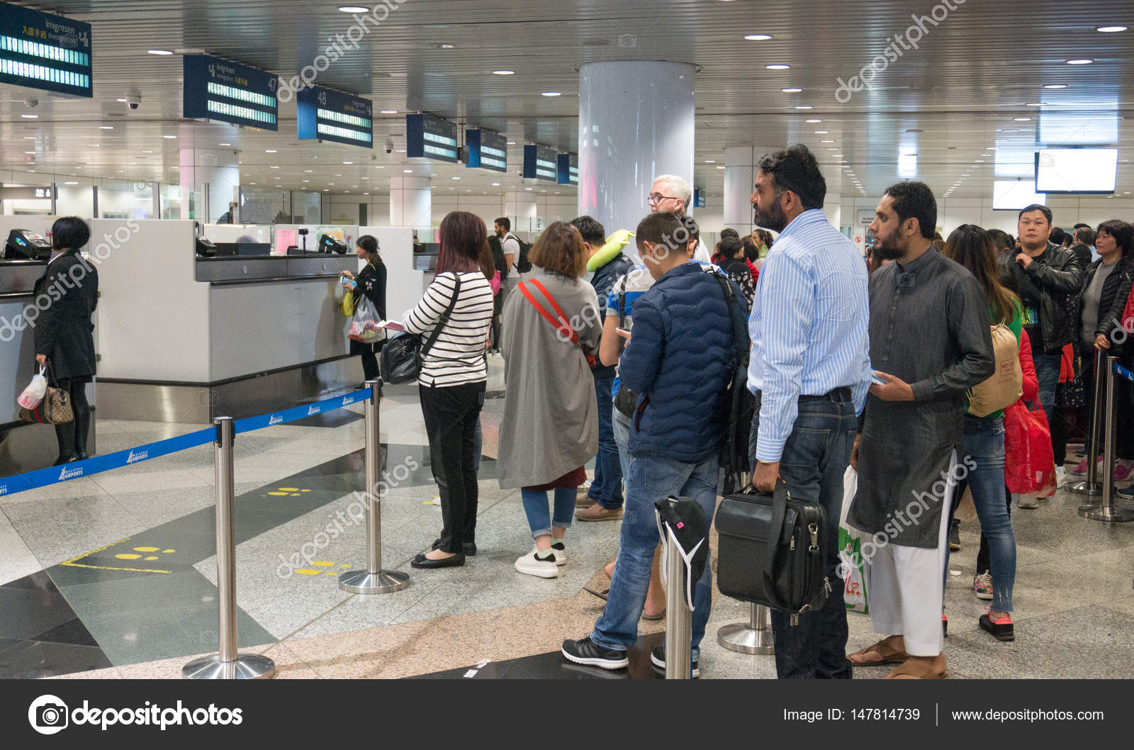 MALAYSIA  MAR 21, 2017 Group of travelers enter immigration control