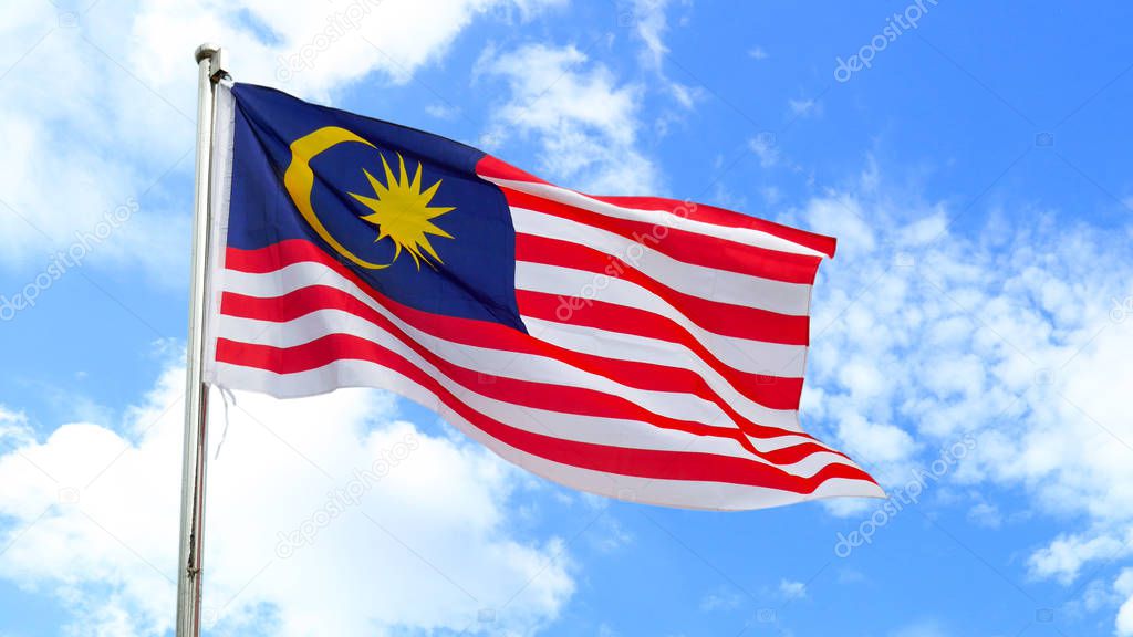 Malaysian national flag on a pole against bright blue sky. Malaysian's flag concept.