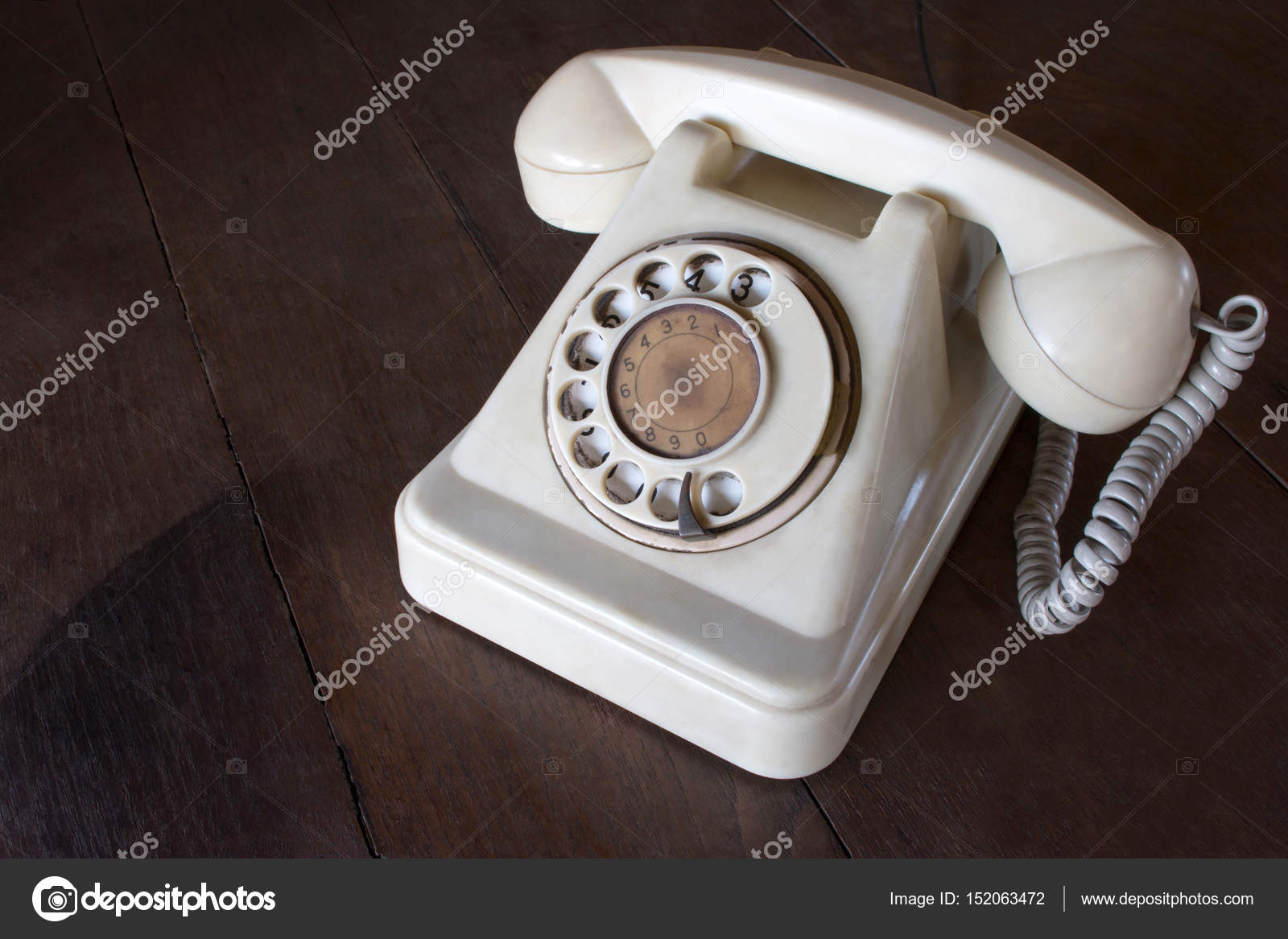 Old White Phone With Dust Circle Dial Pad And Scratches On Wooden Old White Phone With Dust Circle Dial Pad And Scratches On Wooden Retro Desk Vintage Telephone Concept Photo By Wittayayut